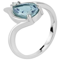 Ezüst ródiummal borított kék topaz és fehér zafír körtermékes gyűrűt készített