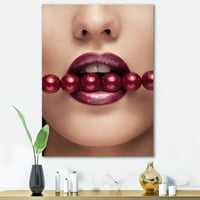 Designart 'Lány vörös gyöngyökkel a szájban érzéki pózban' Modern vászon fal art nyomtatás