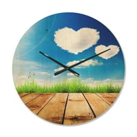 Designart 'Cloud Hearts on Blue Sky Gras Field' parasztház fa falióra